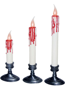 White Candles Dripping Blood. Halloween Table Decoration.